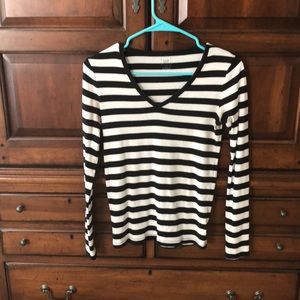 lightly worn black and white striped long sleeve